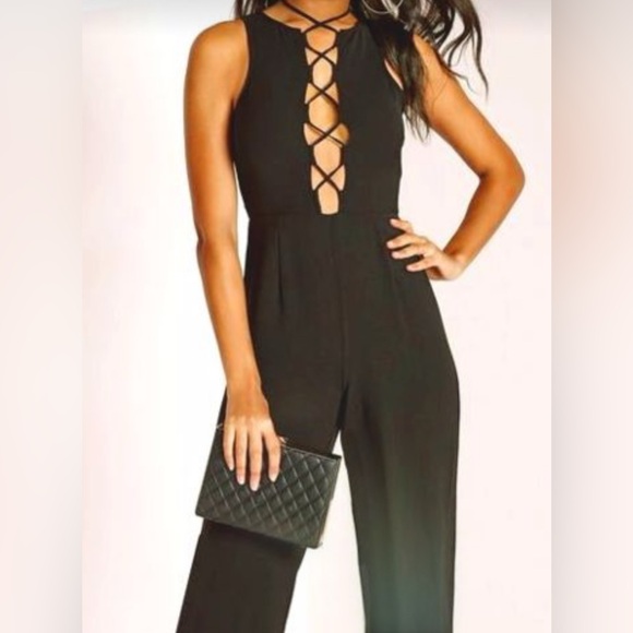Missguided Pants - Missguided Black jumpsuit with lace up front size 12